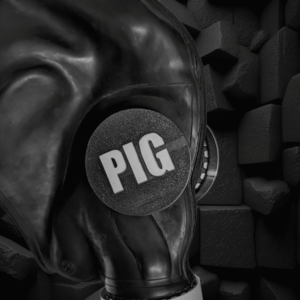 gasmaks with a custom eye cover, with "PIG" written on it