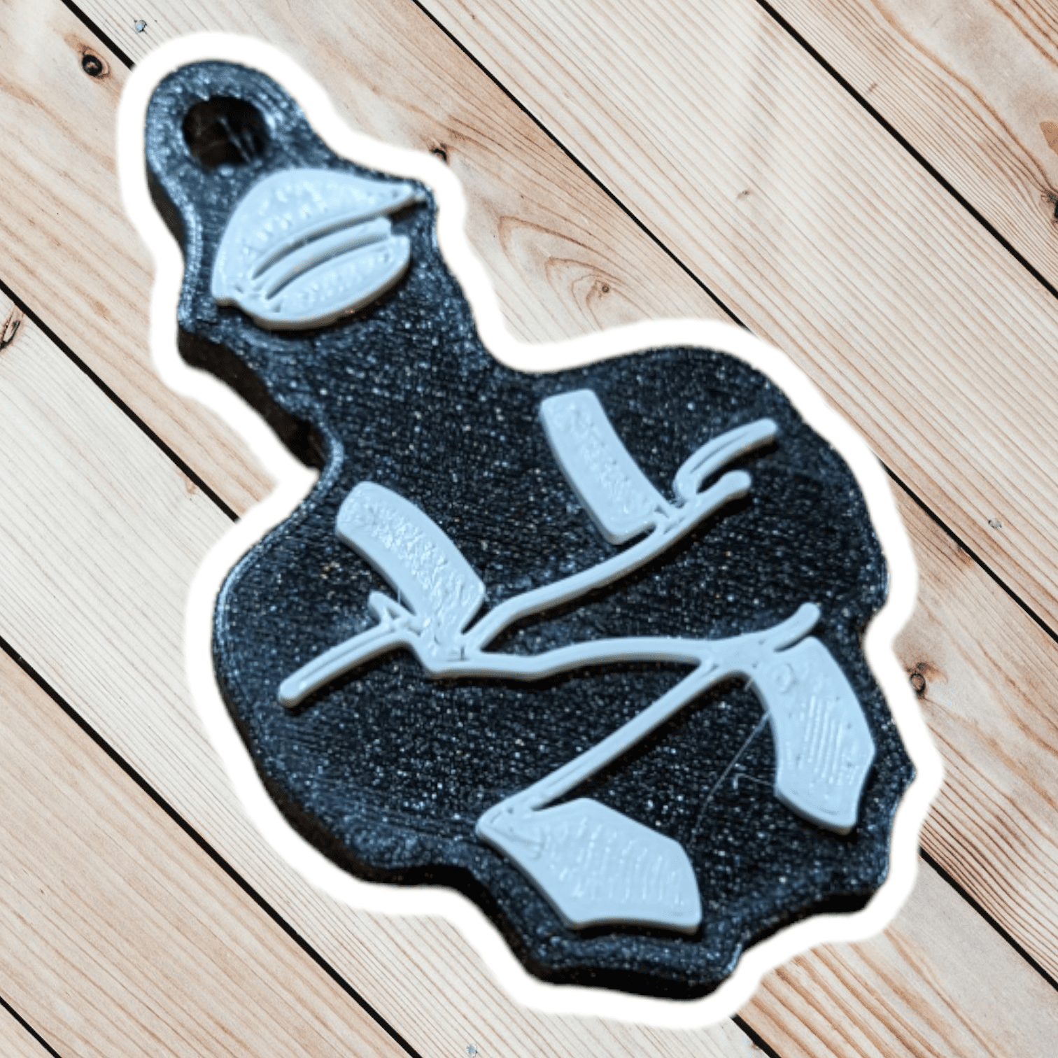 Stylized version of a leather daddy, with muir helmet, leather vest and crossed arms. White details on black.